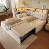 A bedroom scene featuring a modular sofa bed with integrated shelving and lighting. Podgląd zdjęcia produktu
