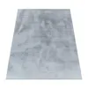 A rectangular rug with a geometric pattern is shown from a slightly elevated angle against a white background. Anteprima dell’immagine prodotto