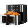 A black and silver dual-basket air fryer filled with cooked chicken wings. Podgląd zdjęcia produktu