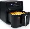 A black air fryer filled with french fries, with its drawer pulled out. Produktbild-Vorschau