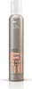 A product shot of a Wella EIMI Natural Volume Styling Mousse can. Produktbild-Vorschau