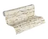 A roll of wallpaper with a stone pattern. Produktbild-Vorschau