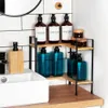 A bathroom counter with a sink and a corner shelf unit holding various toiletries. Náhled obrázku produktu