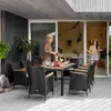 A couple is enjoying a meal on a patio with a dining set. Náhled obrázku produktu