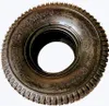 A single tire shown against a white background. Produktbild-Vorschau