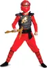 A child wearing a red Ninjago Legacy Kai costume, holding a golden weapon. Podgląd zdjęcia produktu