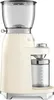 A cream-colored Smeg coffee grinder is shown against a white background. Náhled obrázku produktu