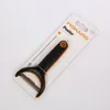 A Fiskars peeler is shown in its retail packaging against a white background. Produktbild-Vorschau
