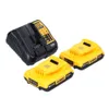 A black battery charger and two yellow DeWALT batteries are arranged on a white background. Anteprima dell’immagine prodotto