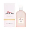A product shot of a Guerlain Mon Guerlain Perfumed Body Lotion bottle and its packaging, presented on a white background. Produktbild-Vorschau