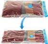 A vacuum-sealed bag before and after compression, showing the reduction in size. Voir les images du produit