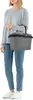 A person holding a shopping basket. Anteprima dell’immagine prodotto