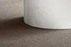 Couchtisch Monobloc rund in Weiß Hochglanz mit geschwungener Kante, Detail der Unterseite. Produktbild-Vorschau
