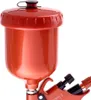 Close-up of the top part of an orange spray gun with a red cup and black lid. Náhled obrázku produktu