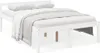A white wooden bed frame with pillows and a blanket. Produktbild-Vorschau