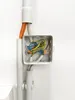 An electrical junction box with wires connected inside, mounted on a white wall. Podgląd zdjęcia produktu