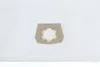 A close-up of a vacuum cleaner bag with a cardboard collar, placed on a white quilted surface. Produktbild-Vorschau