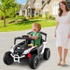 A child is riding in a toy car while a woman walks beside them in front of a house. Náhľad obrázku produktu