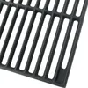 A close-up view of a black cast iron grill grate. Náhľad obrázku produktu