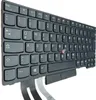 A close-up, angled view of a black laptop keyboard with German keycaps. Produktbild-Vorschau