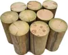 A group of wooden logs arranged in a cluster against a white background. Produktbild-Vorschau