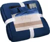 A folded blue blanket or comforter, packaged with a paper band and label. Produktbild-Vorschau