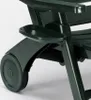 A close-up view of the dark green plastic construction of a lounge chair, focusing on the armrest tray and wheel. Anteprima dell’immagine prodotto