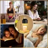 Collage of four scenes: a woman meditating, a woman working on a laptop, a mother and child reading, and a woman sleeping. A central circular image shows a candle warmer lamp with a candle. Náhled obrázku produktu
