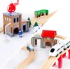 A split image showing two different scenes of a wooden train set with various accessories. Náhled obrázku produktu