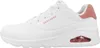 A side view of a white Skechers Uno sneaker with pink accents. Produktbild-Vorschau