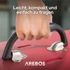 A hand is holding the handle of a red tool case. Náhled obrázku produktu