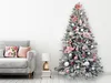 A decorated Christmas tree stands next to a sofa in a room. Náhľad obrázku produktu