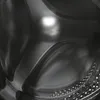 Close-up view of the inside of a washing machine drum. Produktbild-Vorschau