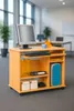 A computer desk with a monitor, keyboard, and computer tower in an office setting. Produktbild-Vorschau