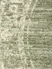 A close-up of a textured fabric with a mottled green and white pattern. Anteprima dell’immagine prodotto