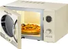 A retro-style cream microwave with its door open, revealing a pizza inside. Podgląd zdjęcia produktu