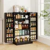 A dark-colored pantry cabinet filled with various food items and kitchenware, placed in a room with a window. Podgląd zdjęcia produktu