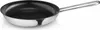 A stainless steel frying pan with a black interior is shown against a white background. Voir les images du produit