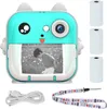 A blue and white mini thermal printer with a camera, designed to look like a cartoon animal, is shown with three rolls of thermal paper, a USB cable, and a lanyard. Produktbild-Vorschau