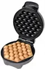 An open waffle maker with cooked bubble waffles on the bottom plate. Náhľad obrázku produktu