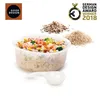 A bowl of rice with shrimp and broccoli, next to piles of uncooked rice and a measuring scoop. There are also marketing badges in the top right and top left corners. Voir les images du produit
