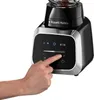 Close-up of a person's hand interacting with the control panel of a blender. Produktbild-Vorschau