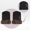 A pair of black children's stroller mittens with brown faux fur trim, shown with a close-up inset of the top of one mitten. Produktbild-Vorschau