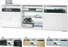 A white TV stand with multiple compartments and shelves, displaying electronic devices and accessories. Below the main image are smaller images showing the TV stand in different color variations. Produktbild-Vorschau