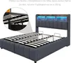 A bed frame with a headboard featuring LED lights and a close-up view of the slatted base. Produktbild-Vorschau