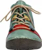 A close-up, front-facing view of a green leather boot with colorful accents and laces. Anteprima dell’immagine prodotto