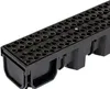 A close-up, angled view of a black drainage channel with a hexagonal grate. Anteprima dell’immagine prodotto