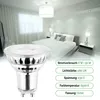 A close-up of an LED light bulb with a bedroom scene in the background. Produktbild-Vorschau