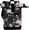 A roll-top backpack with a floral pattern. Produktbild-Vorschau