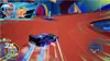 A racing game scene with a car on a track and a character in a corner. Produktbild-Vorschau